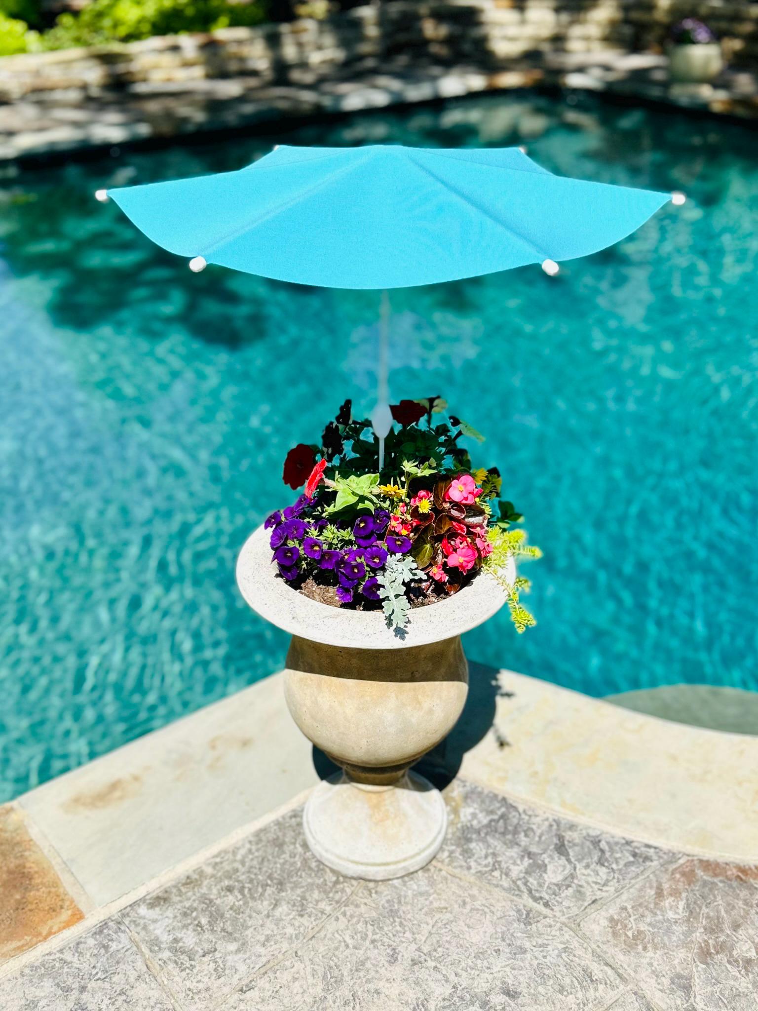 Plant Cabana™ – All the Sun. None of the Heat. Beautiful Protection for Potted Plants. 28” Wide x 30” Tall. Simple Assembly Required.
